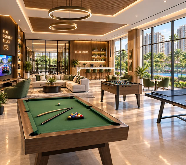 Indoor clubhouse games lounge at Experion One 42 with a pool table, foosball, table tennis and bar seating