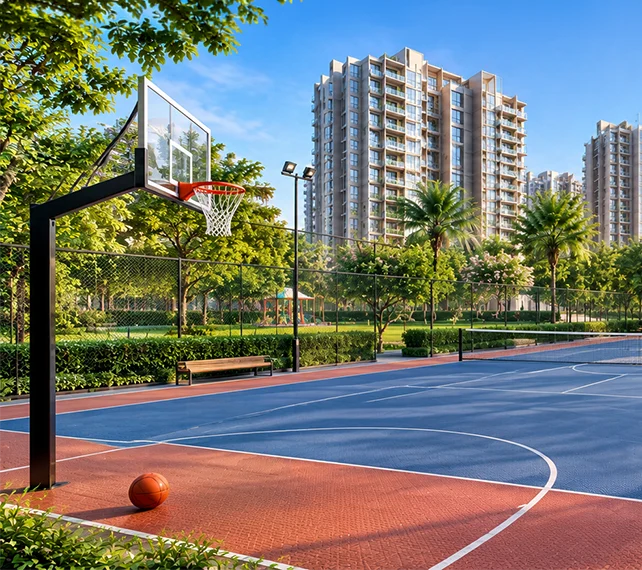 Outdoor basketball and tennis courts at Experion One 42 with the residential towers behind
